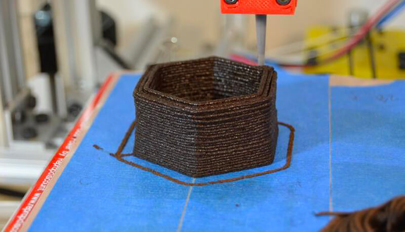 A 3D printed structure being made using coffee-based filament
