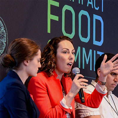 Panel speaking at the inaugural Food Impact Summit