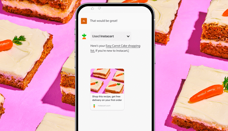 Instacart on a phone in front of some slices of carrot cake